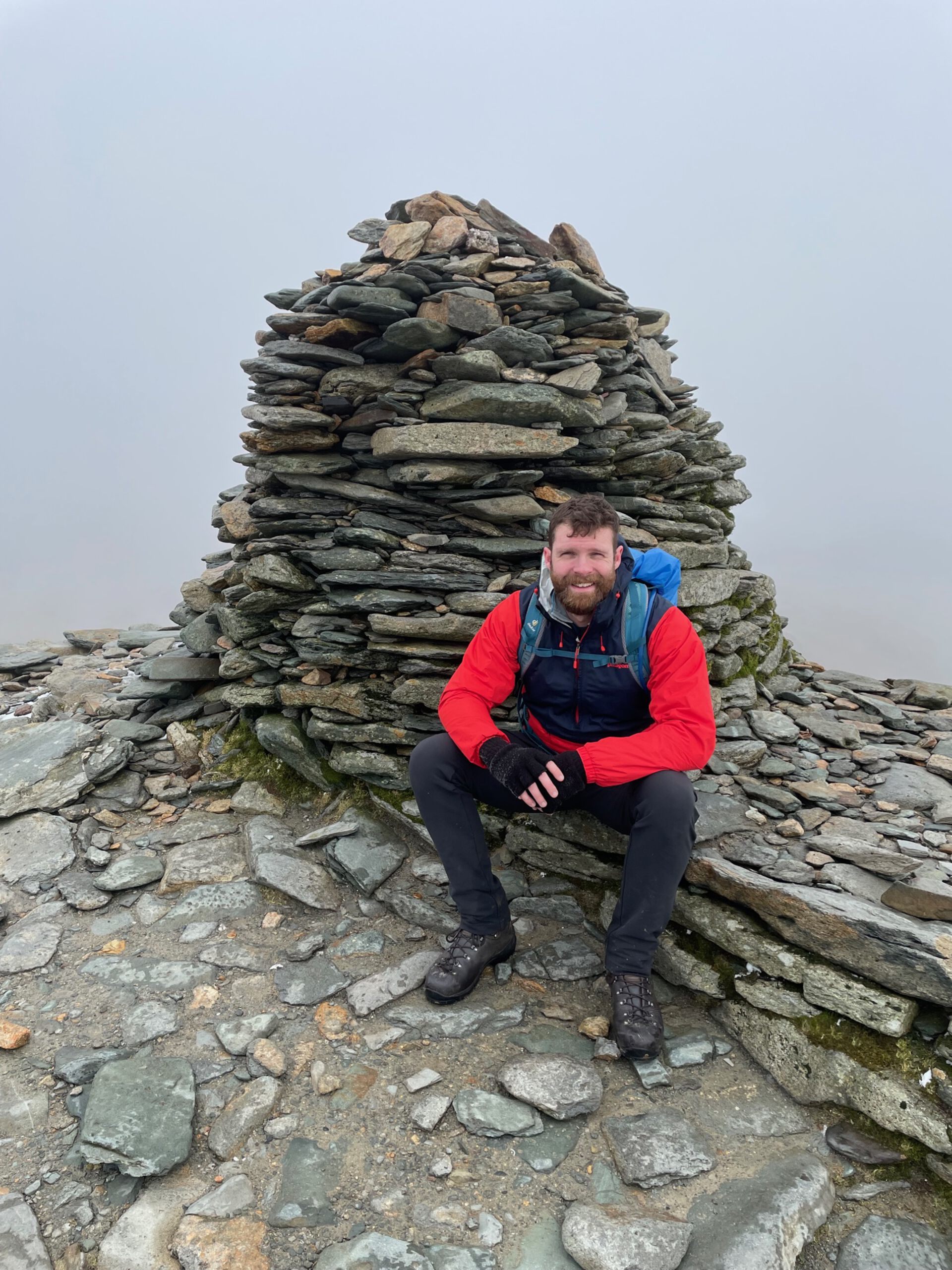 Yours truly with the summit cairn on the Old Man of Coniston