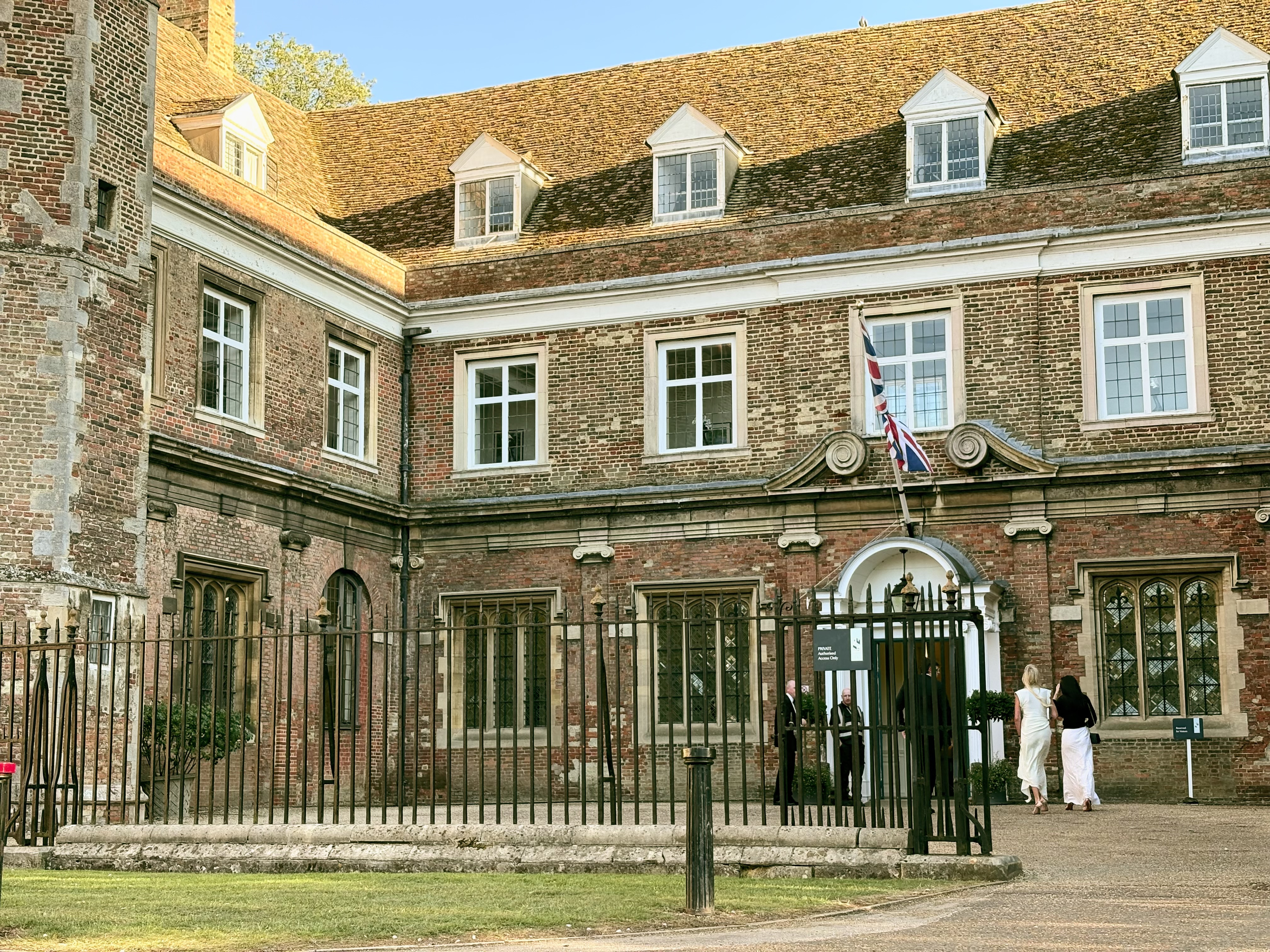 The entrance to King’s Ely: red brick, Tudor architecture, terracotta roof tiles.