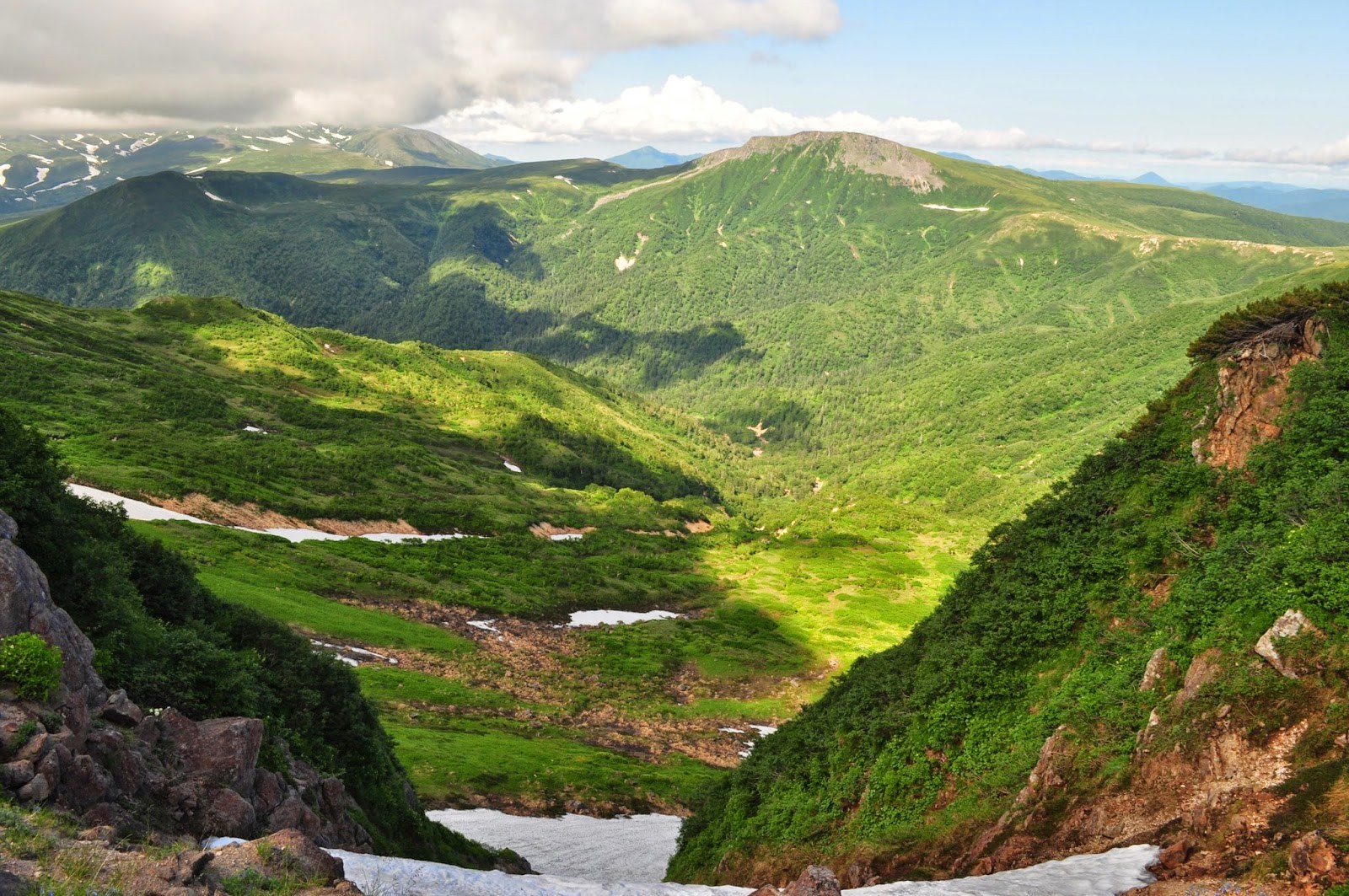 Looking down into the massive valley of the Chubetsu-gawa, covered thick in bright green trees