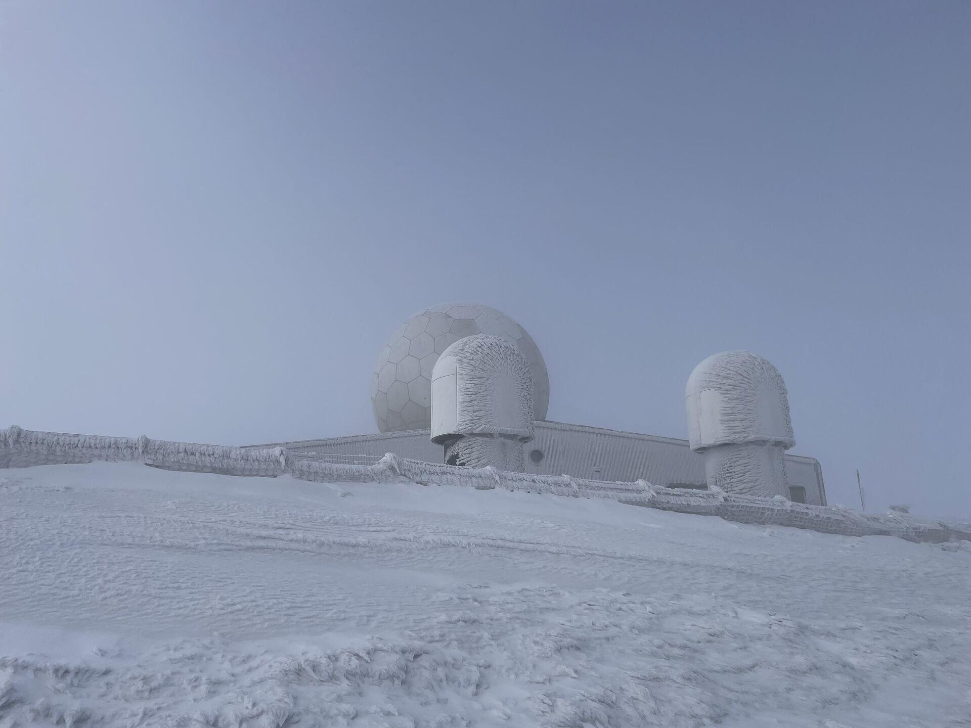 The radar station on top of Cross Fell covered in windblown snow