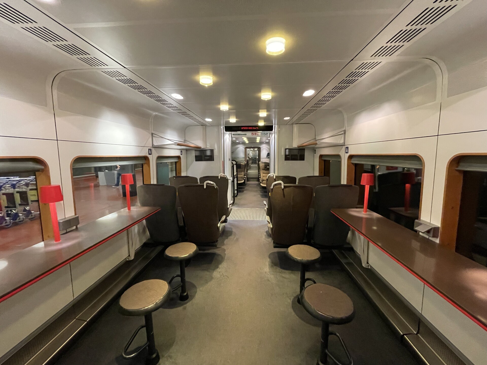 The interior of the dining car on a train that takes 18 minutes to reach its destination