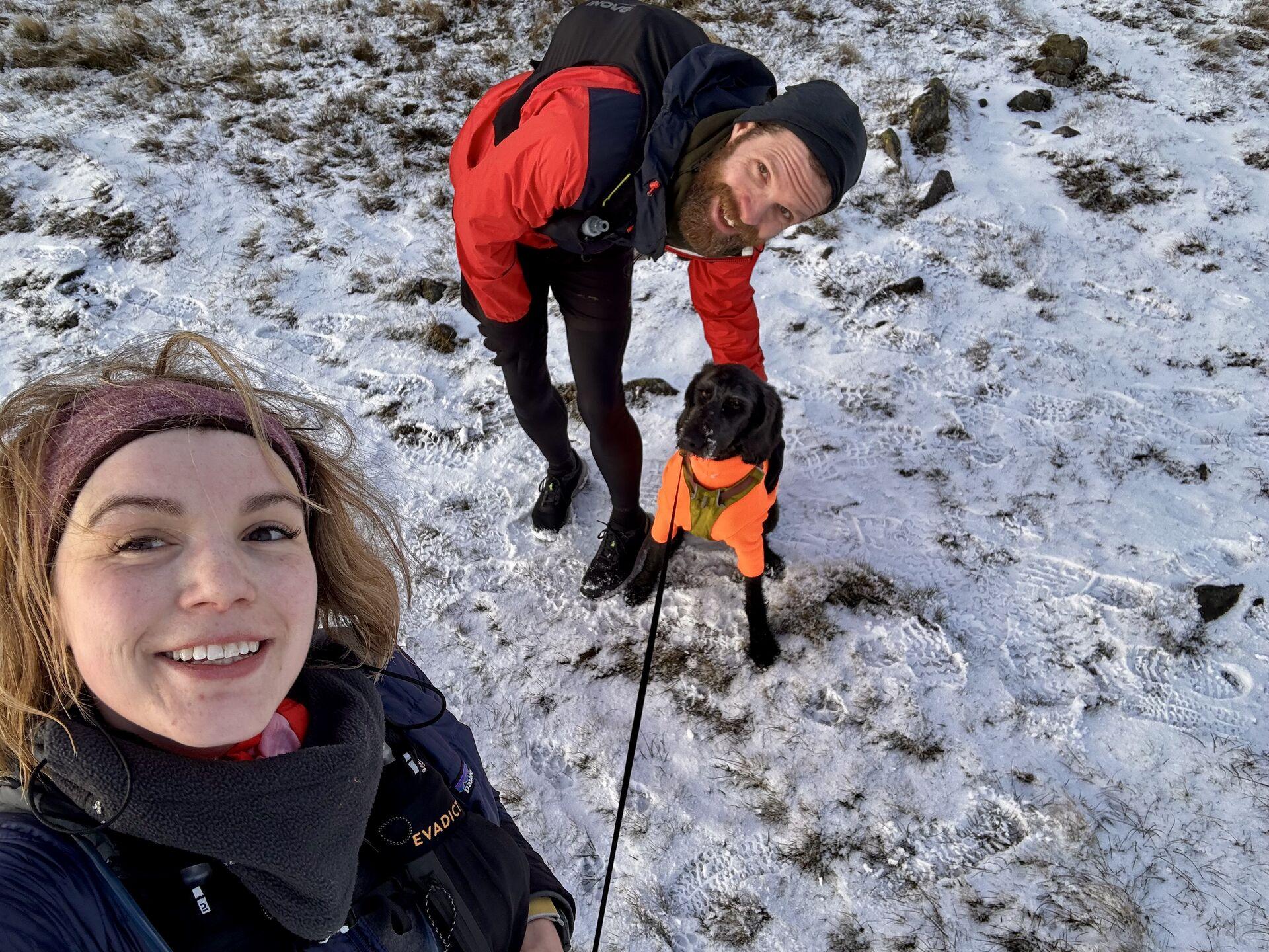 Me and Sam, taking a selfie with Ghyll in his orange fleece, with a light dusting of snow on the grassy ground