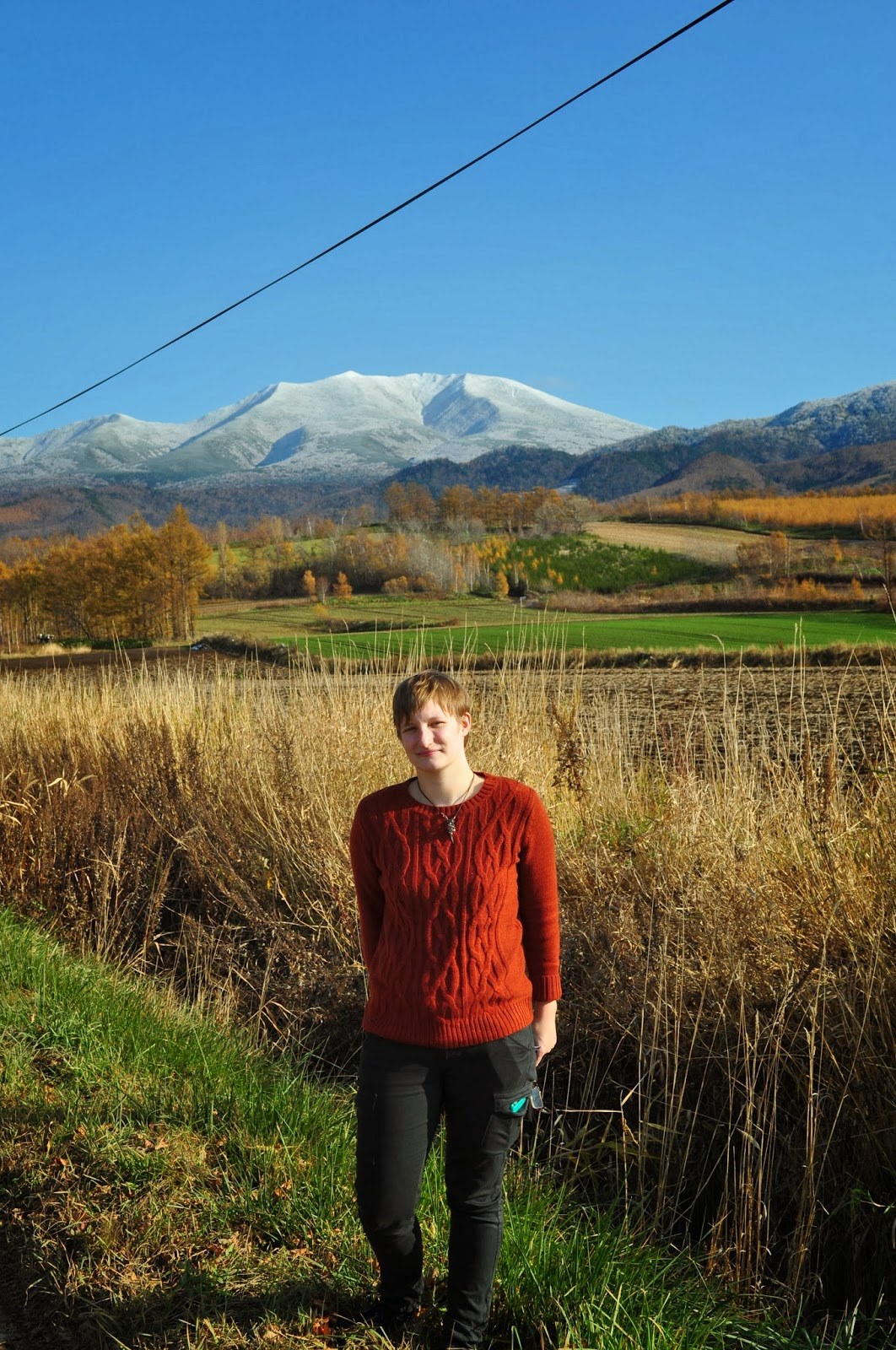 Jordan standing in front of, I think, Unabetsu-dake, on the road to Shiretoko