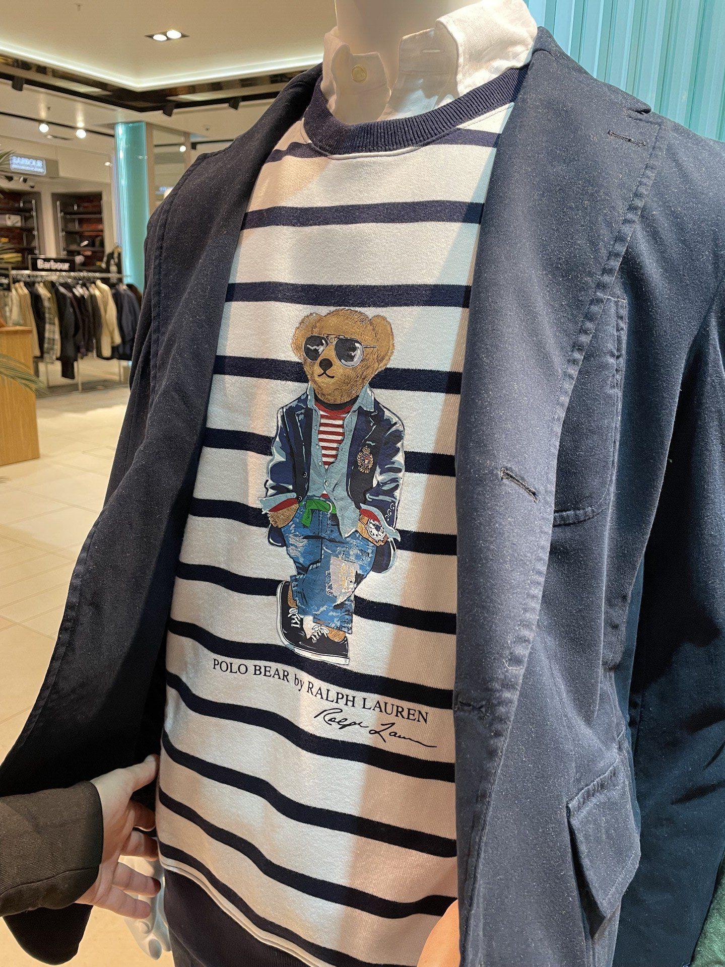 A plain-looking long-sleeve tshirt with a printed classy bear on the front, labeled "Polo Bear by Ralph Lauren"