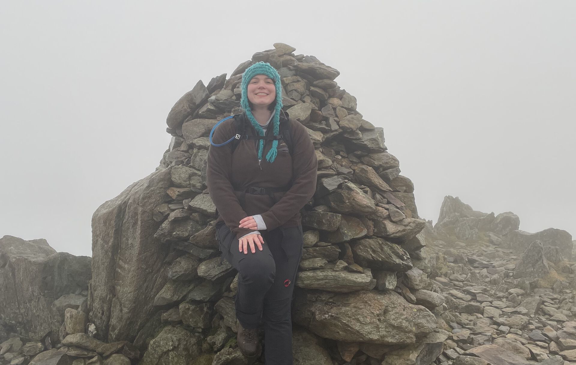 Sam at the cloudy summit of Swirl How